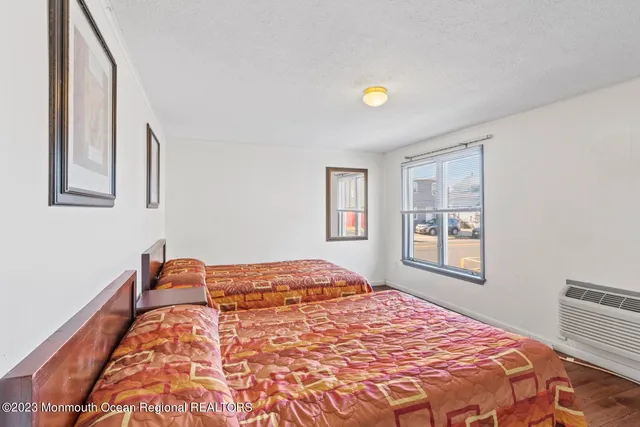 a utility room with cabinets washer and dryer