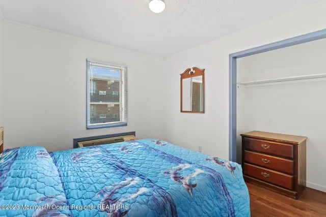 an aerial view of a balcony with chairs