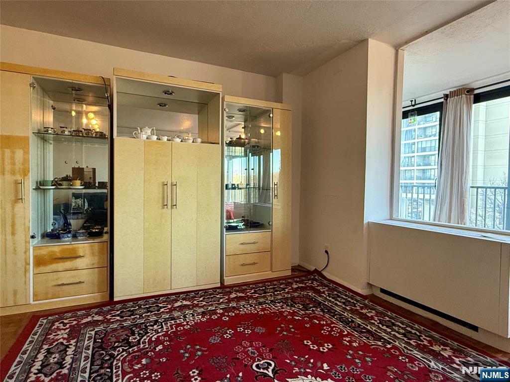 5 Horizon Road, Unit 307 Fort Lee, NJ 07024 - Photo 18 of 31 a view of a wooden door and a window