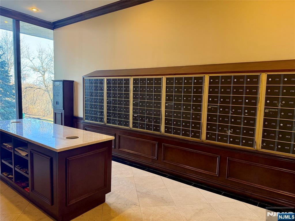 5 Horizon Road, Unit 307 Fort Lee, NJ 07024 - Photo 26 of 31 a view of a large room with wooden floor and windows