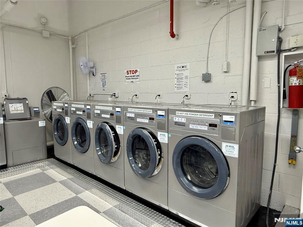 5 Horizon Road, Unit 307 Fort Lee, NJ 07024 - Photo 30 of 31 a utility room with dryer and washer