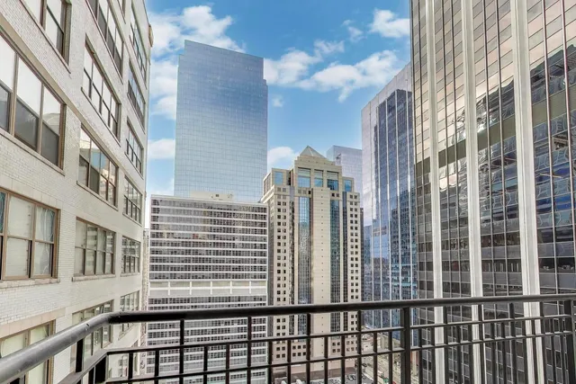 a view of a building from a balcony