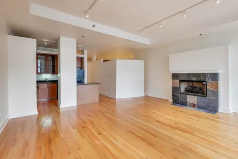 a view of a kitchen with a sink and a kitchen