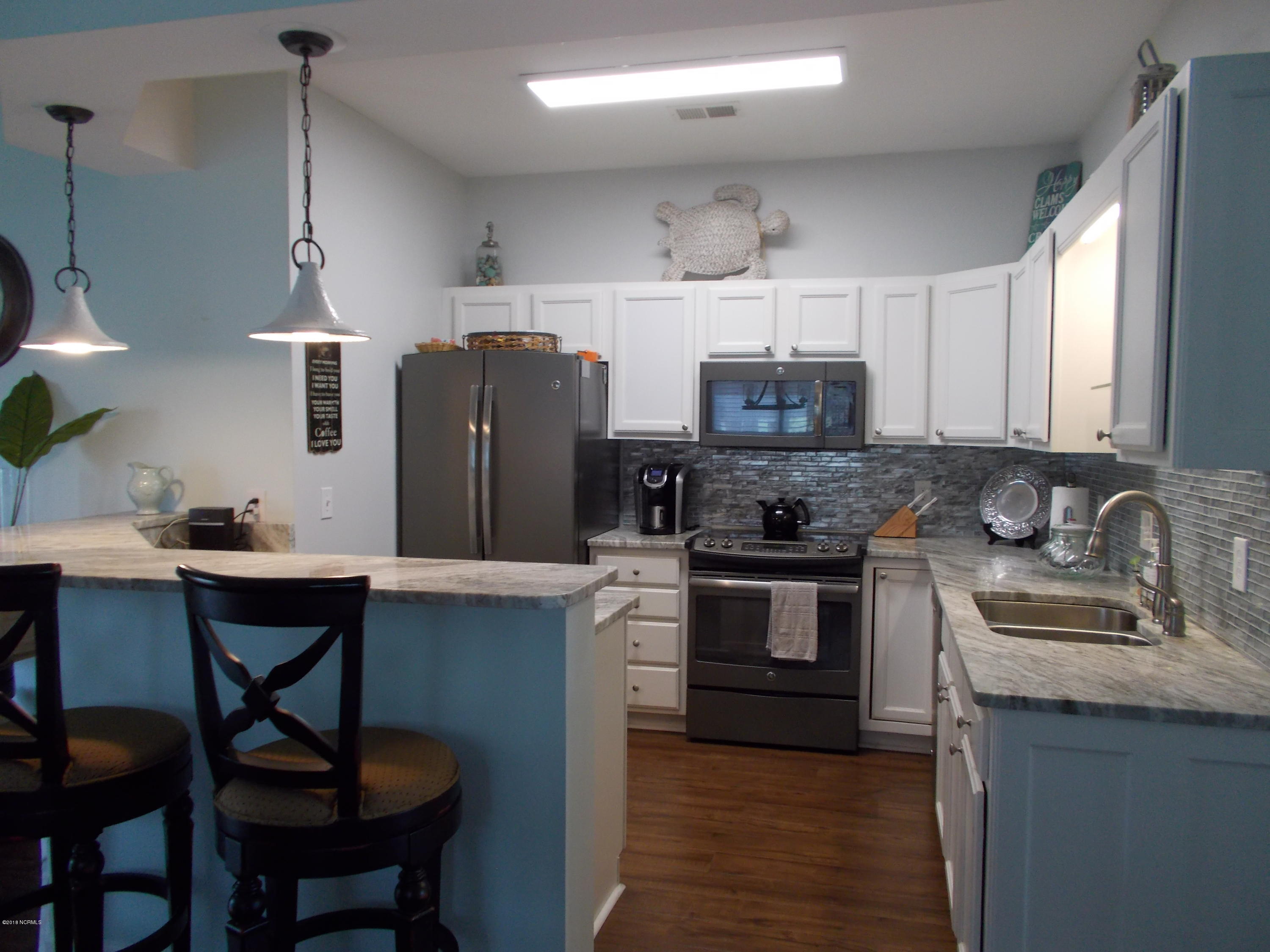 102 Rice Mill Circle, Unit U1 Sunset Beach, NC 28468 - Photo 6 of 17 DSCN0014