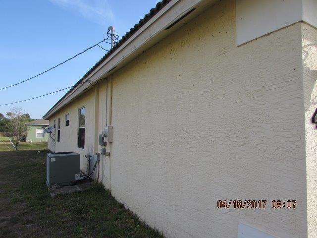 401 Southwest Parish Terrace Port St. Lucie, FL 34984 - Photo 2 of 29 IMG_5238