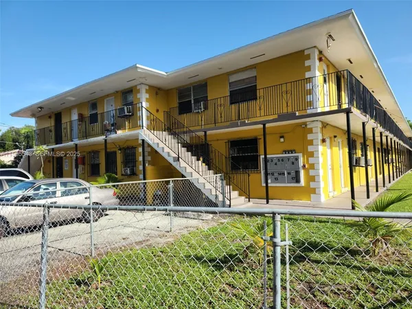 a view of house with yard and entertaining space