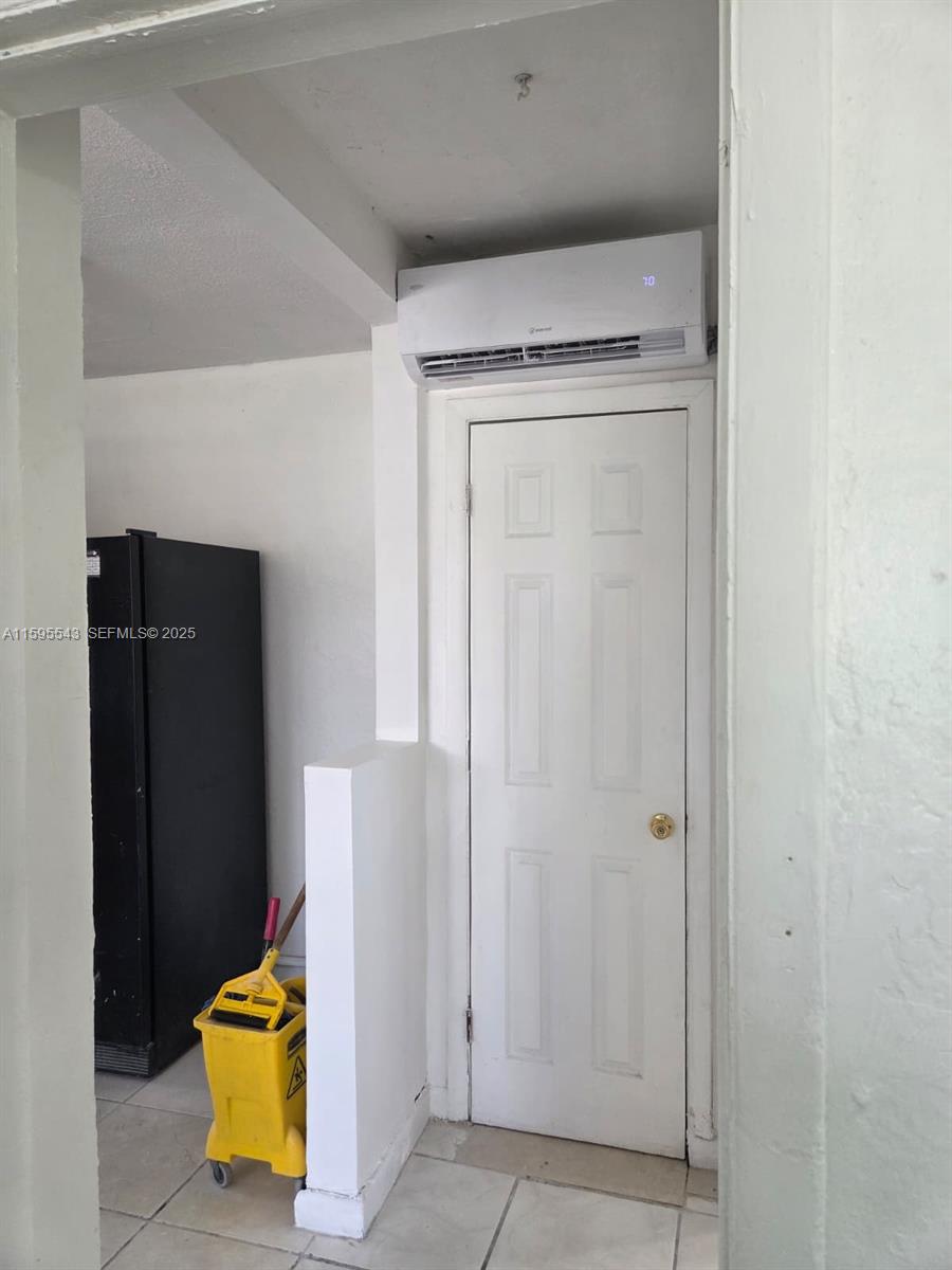 5600 Northwest 7th Court, Unit 14 Miami, FL 33127 - Photo 6 of 8 a view of walk in closet