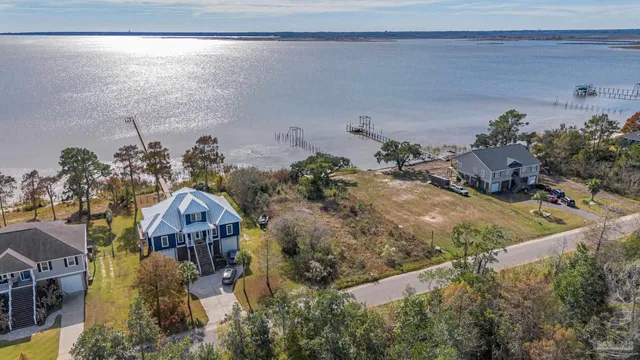 a view of lake with green space