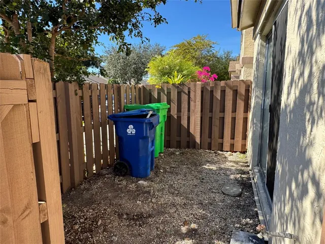 a view of a wooden fence