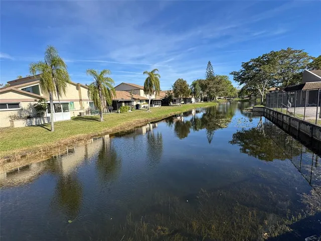 a view of a lake with houses