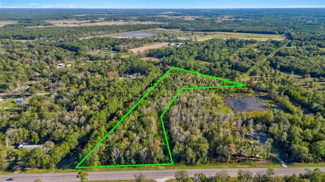 an aerial view of a yard with houses