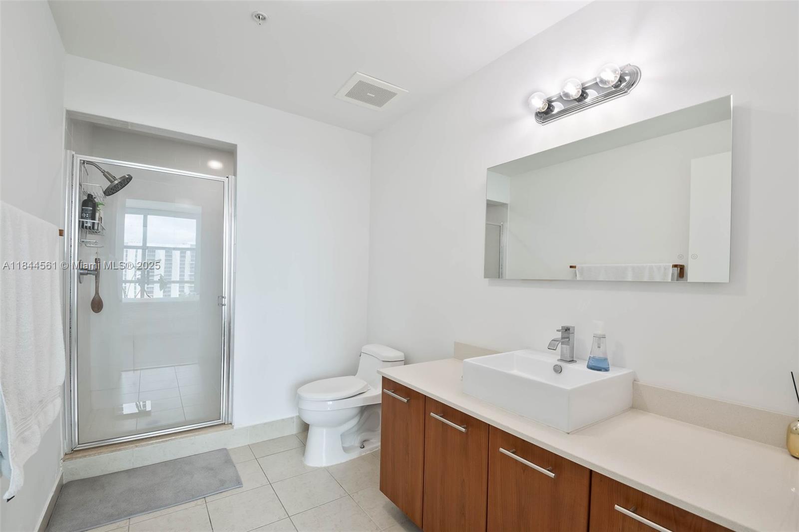 3301 Northeast 1st Avenue, Unit H1211 Miami, FL 33137 - Photo 13 of 37 a bathroom with a sink toilet and shower