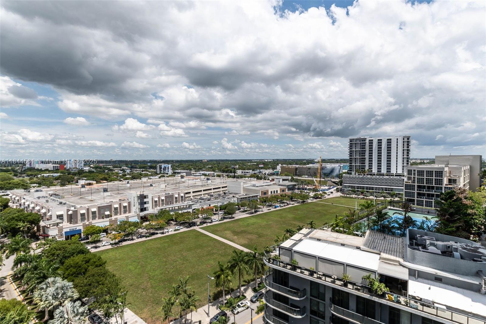3301 Northeast 1st Avenue, Unit H1211 Miami, FL 33137 - Photo 18 of 37 an aerial view of residential houses with outdoor space