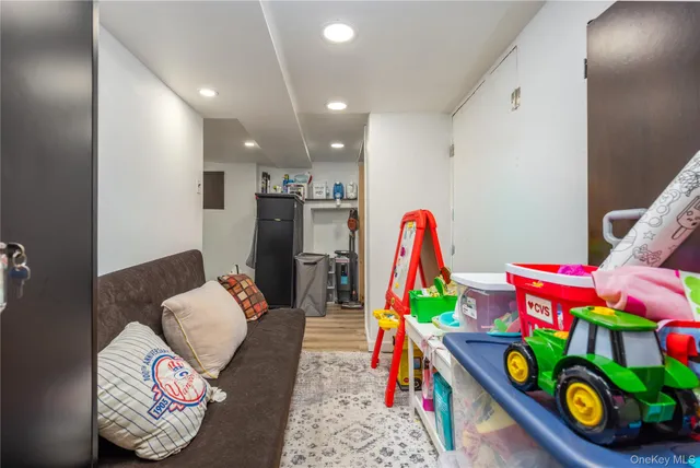 a living room with furniture and a rug