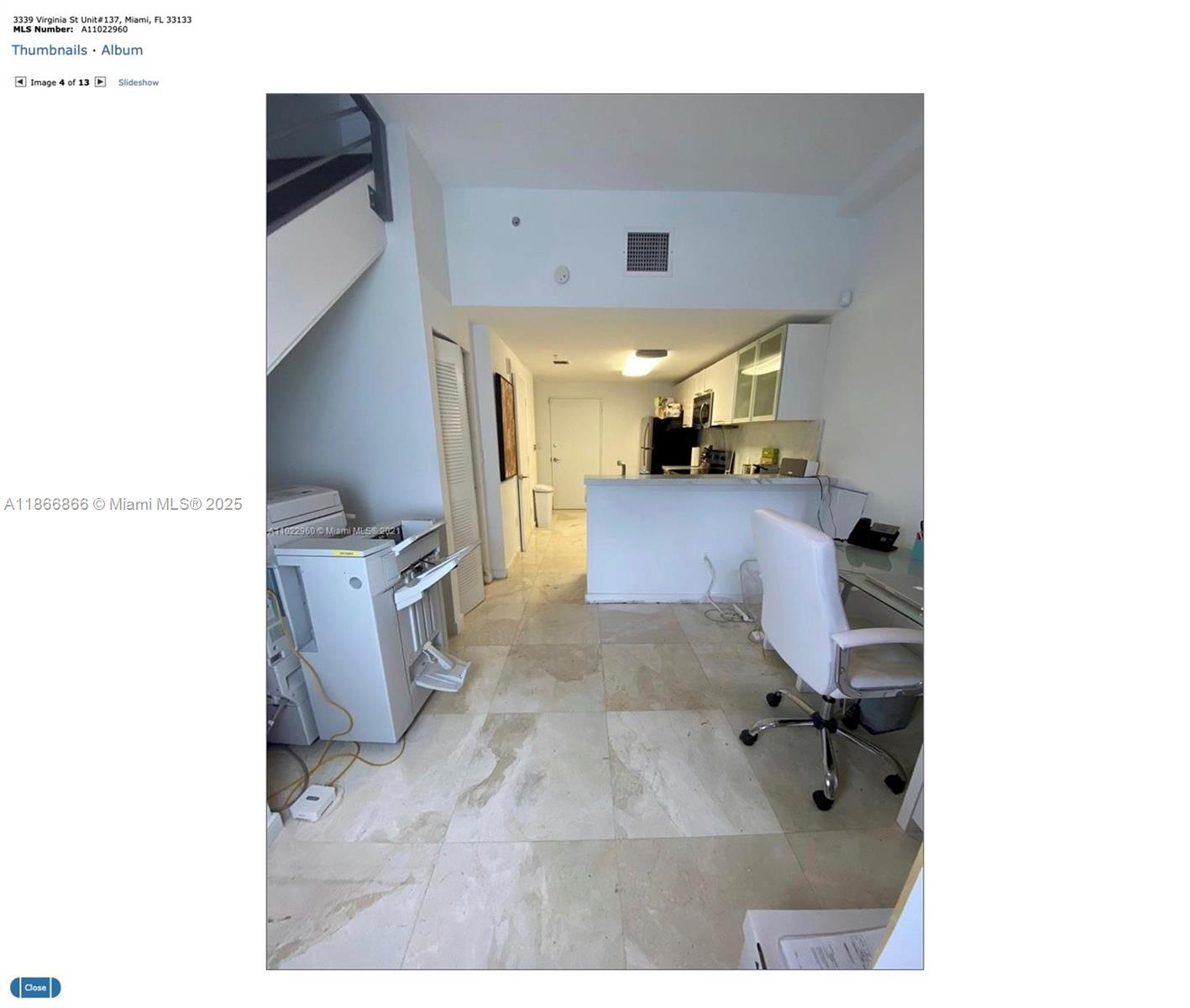 3339 Virginia Street, Unit 137 Miami, FL 33133 - Photo 4 of 11 a living room with furniture and a flat screen tv