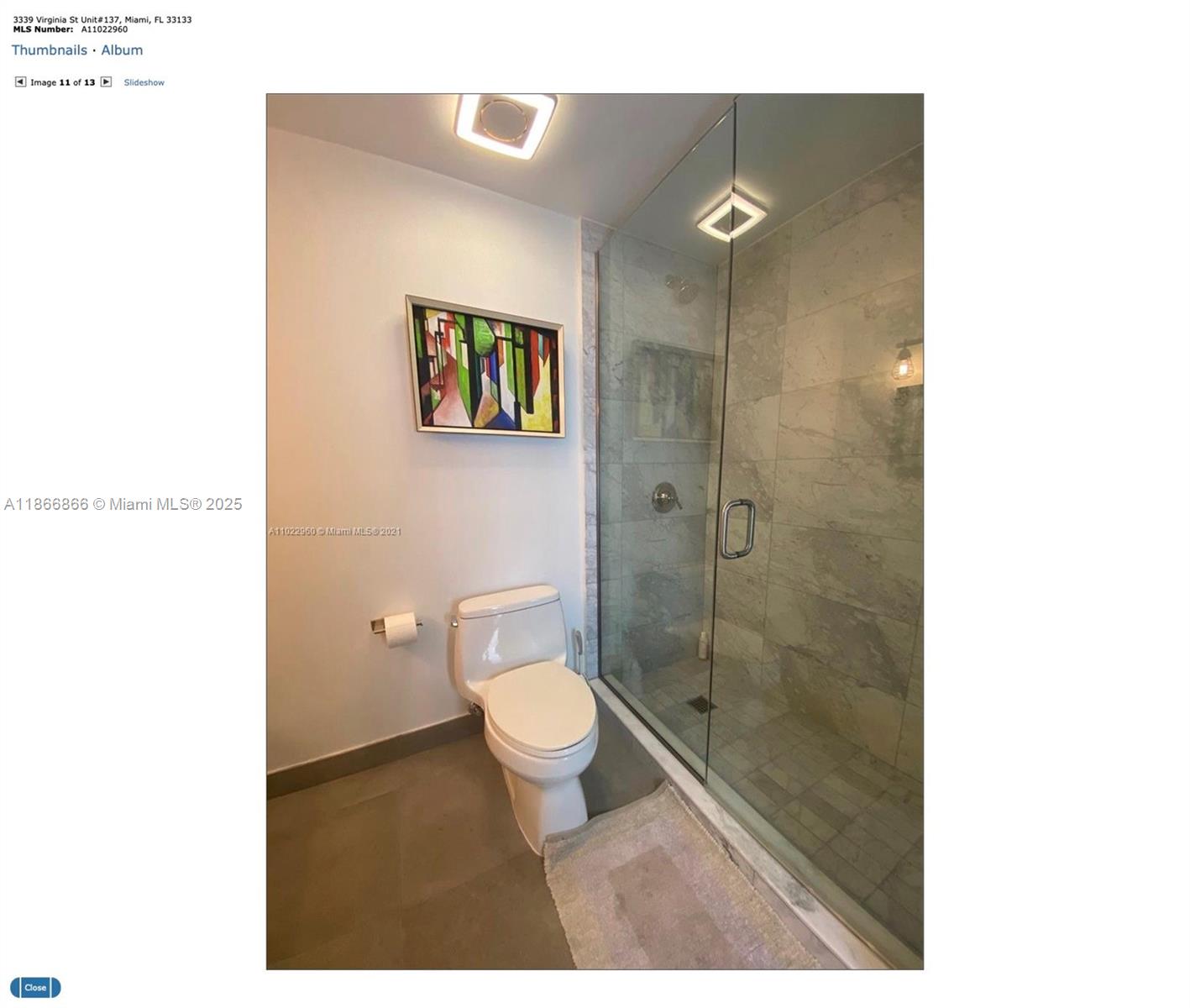 3339 Virginia Street, Unit 137 Miami, FL 33133 - Photo 6 of 11 a bathroom with a toilet a sink and a shower