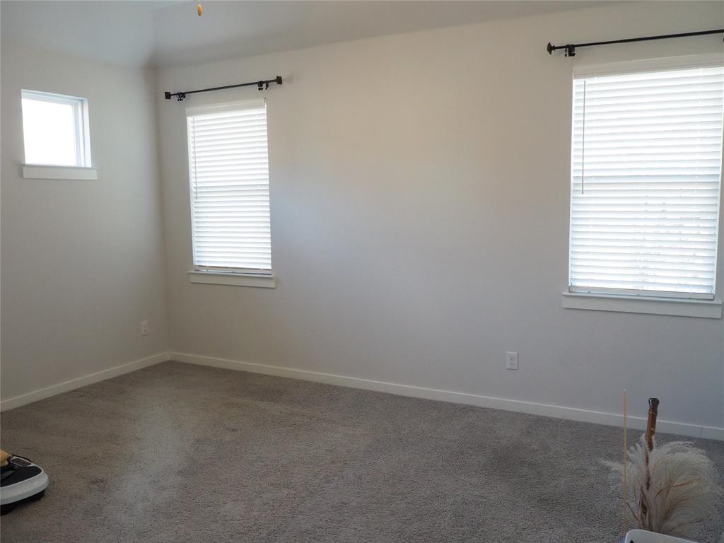 2502 Sun Grove Road Melissa, TX 75454 - Photo 15 of 40 an empty room with a window