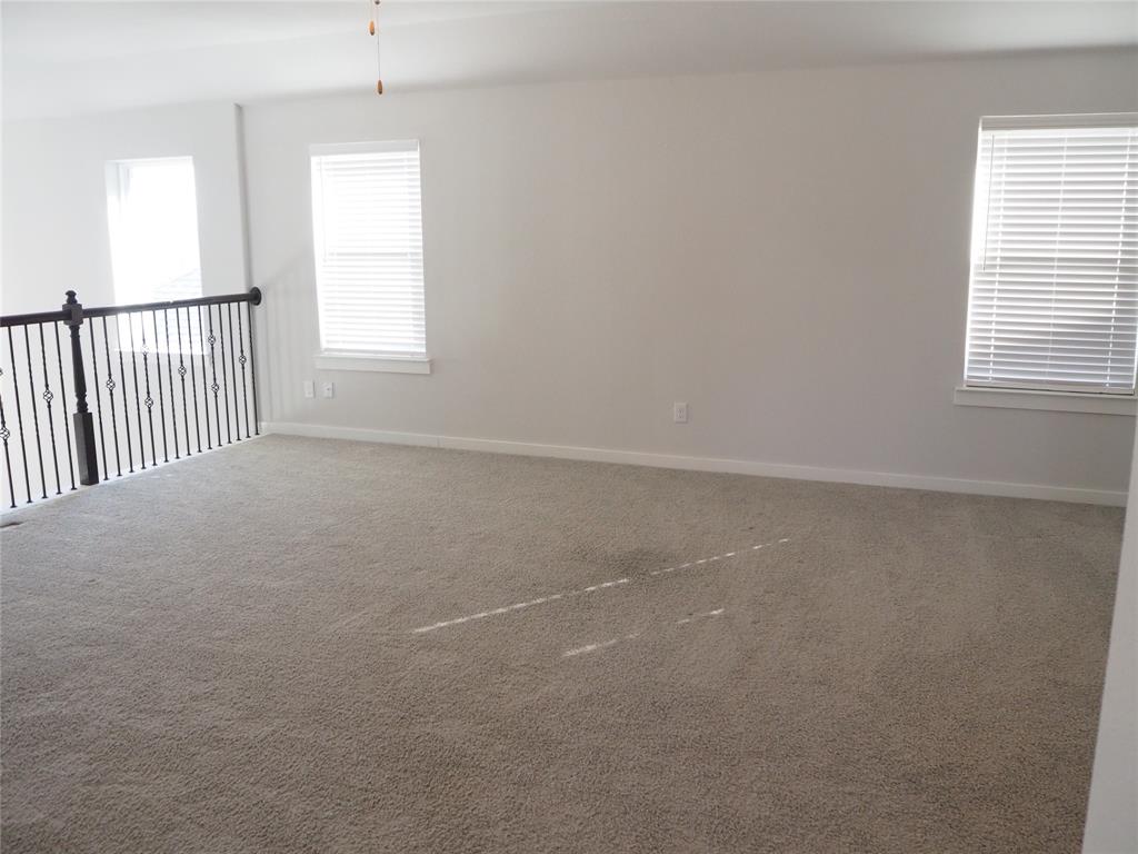 2502 Sun Grove Road Melissa, TX 75454 - Photo 21 of 40 an empty room with windows