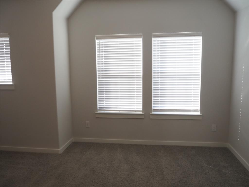 2502 Sun Grove Road Melissa, TX 75454 - Photo 23 of 40 an empty room with a window