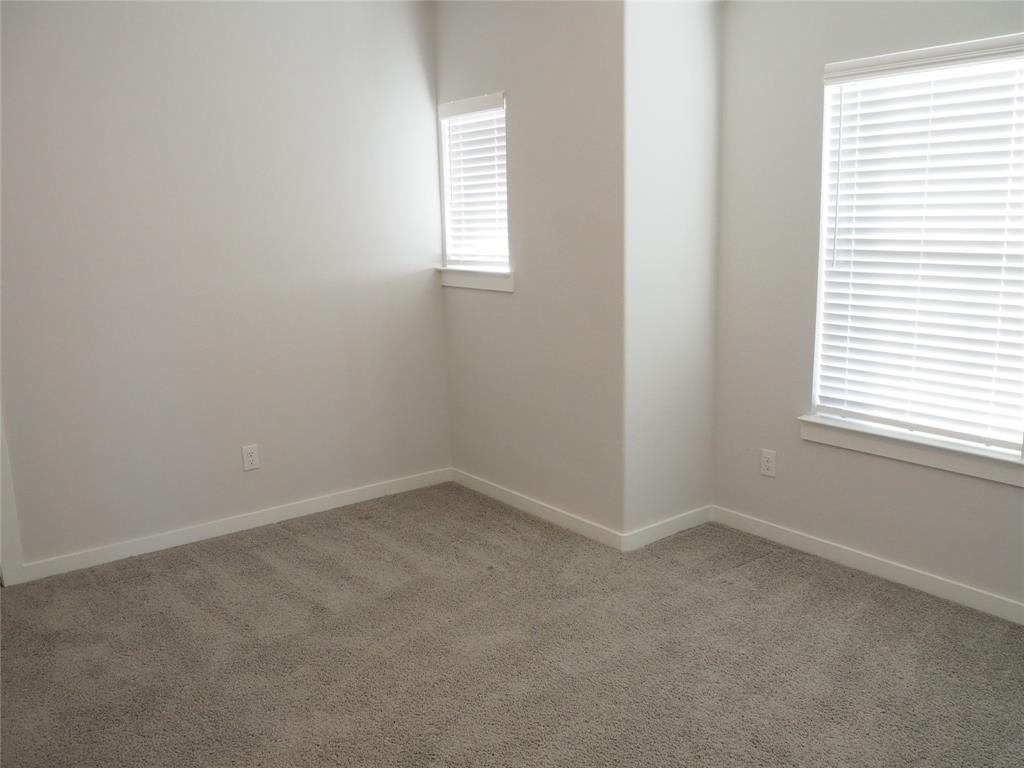 2502 Sun Grove Road Melissa, TX 75454 - Photo 24 of 40 an empty room with a window
