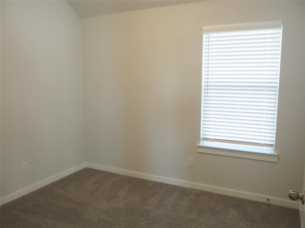 2502 Sun Grove Road Melissa, TX 75454 - Photo 27 of 40 an empty room with a window