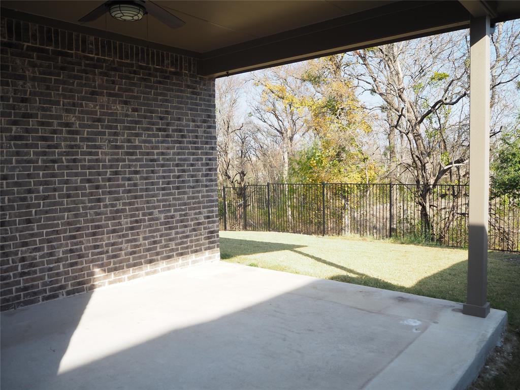 2502 Sun Grove Road Melissa, TX 75454 - Photo 33 of 40 a view of backyard with large trees