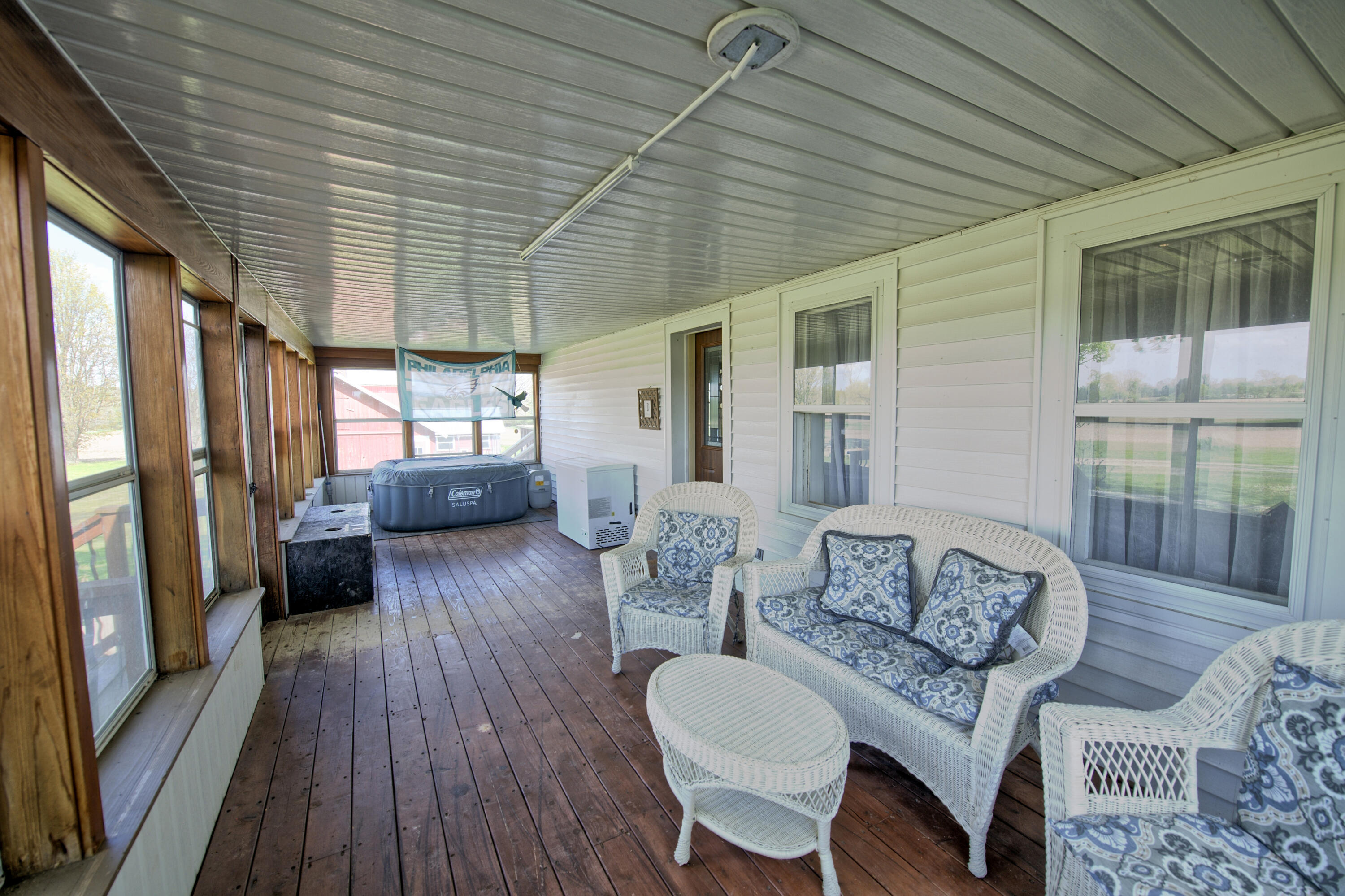 8250 Oneida Road Grand Ledge, MI 48837 - Photo 23 of 55 3 season enclosed porch