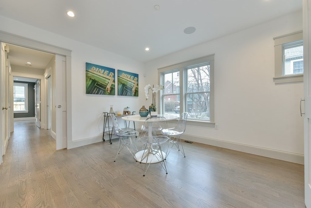 34 Rossmore Road, Unit ONE Boston, MA 02130 - Photo 11 of 21 a view of a livingroom with furniture window and wooden floor