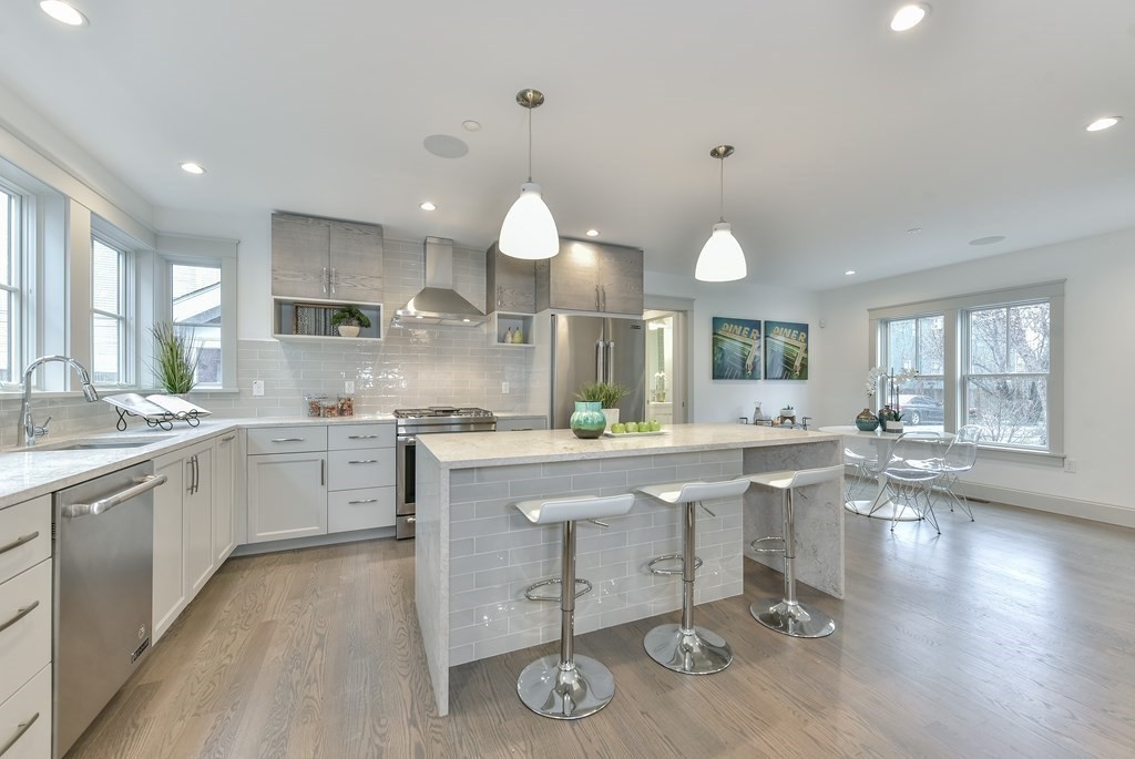 34 Rossmore Road, Unit ONE Boston, MA 02130 - Photo 4 of 21 a kitchen with a sink cabinets and window