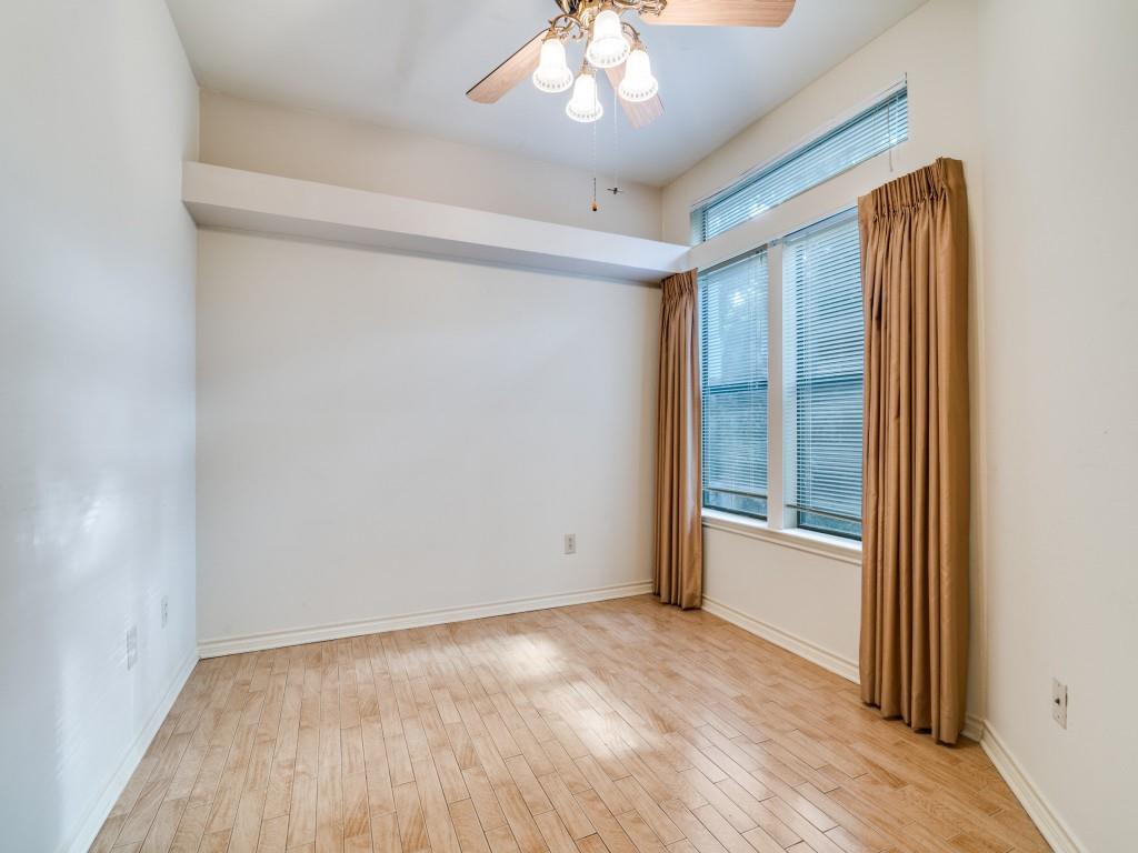 9981 Waterfront Trail Rowlett, TX 75087 - Photo 13 of 26 an empty room with wooden floor and windows