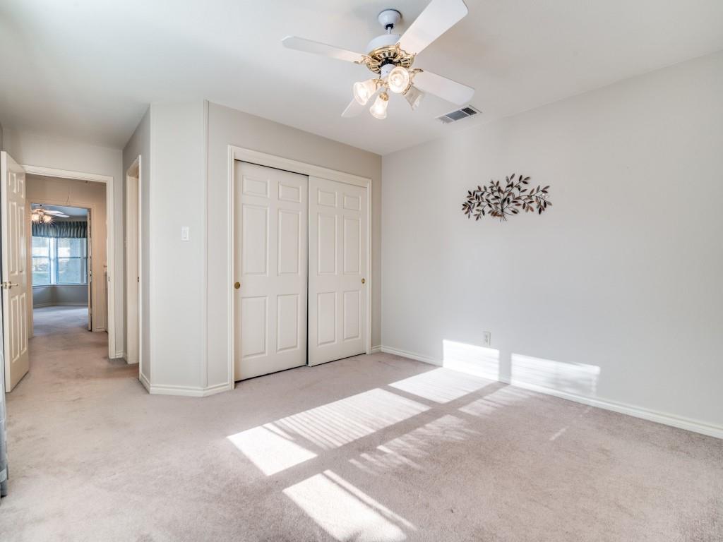 9981 Waterfront Trail Rowlett, TX 75087 - Photo 15 of 26 a view of a livingroom with a chandelier fan