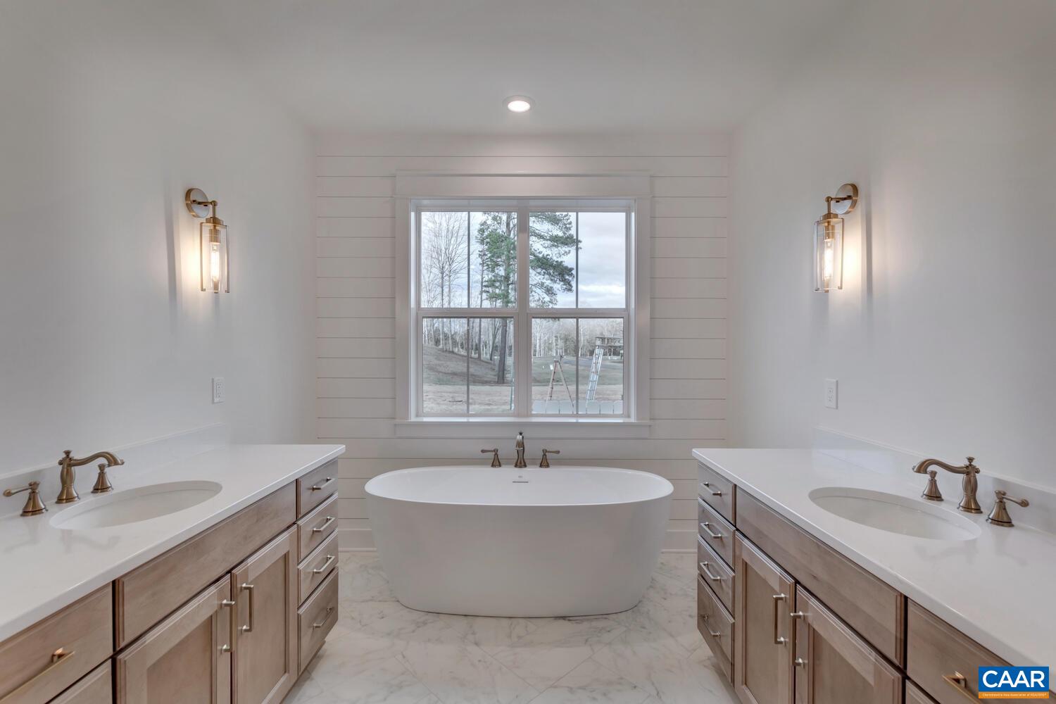 2 Jarmans Gap Road, Unit LOT 2 JARMANS GAP Crozet, VA 22932 - Photo 24 of 48 a bathroom with a sink double vanity and a tub