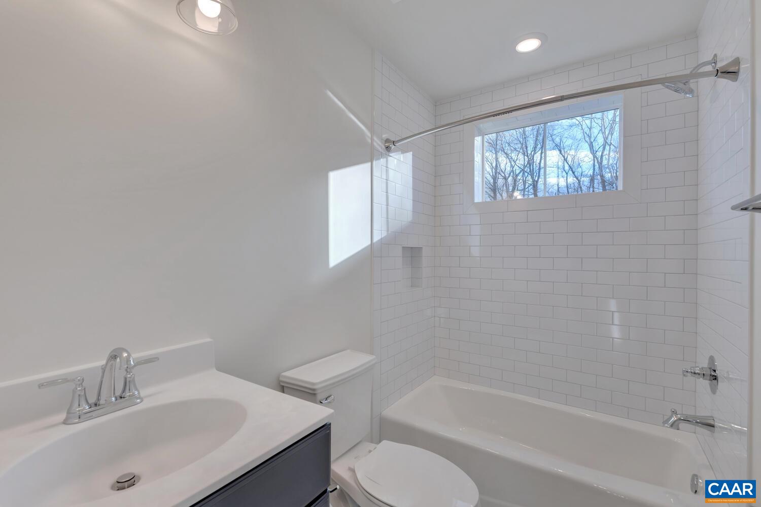 2 Jarmans Gap Road, Unit LOT 2 JARMANS GAP Crozet, VA 22932 - Photo 31 of 48 a bathroom with a sink toilet and bathtub