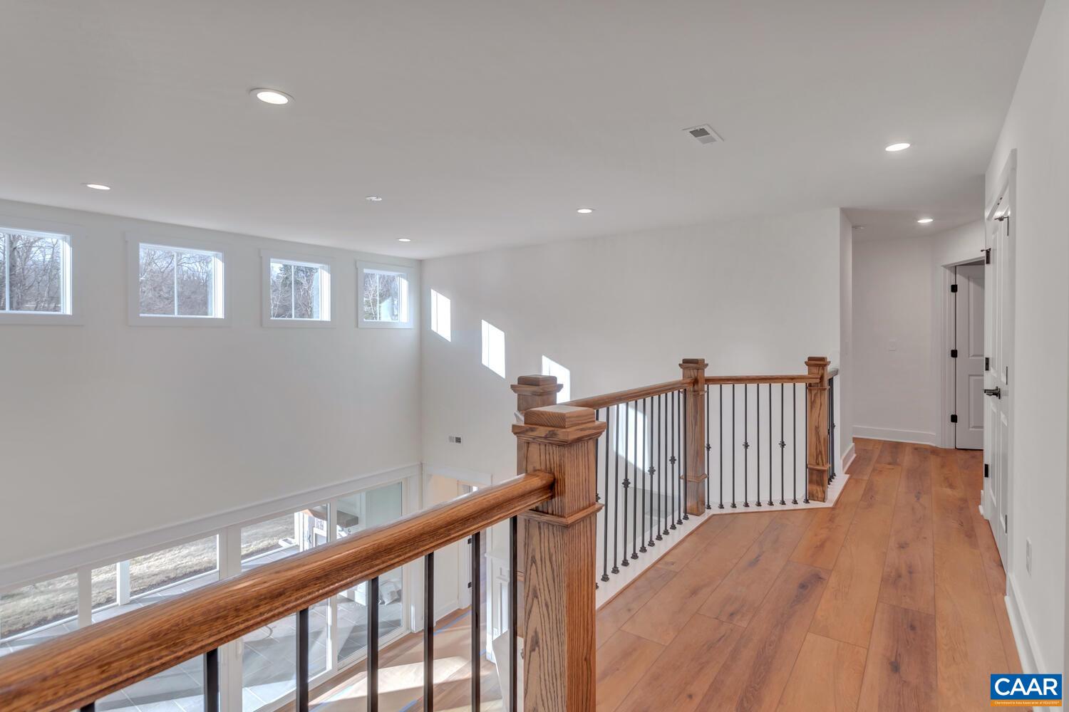 2 Jarmans Gap Road, Unit LOT 2 JARMANS GAP Crozet, VA 22932 - Photo 36 of 48 a view of a hallway with wooden floor