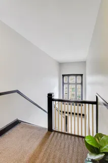 a view of entryway with stairs