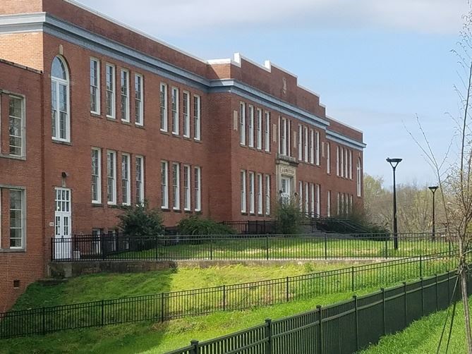 200 East Umstead Street Durham, NC 27707 - Photo 3 of 6 a view of a house with a yard