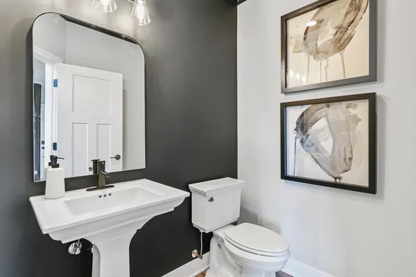 a bathroom with a sink and a toilet