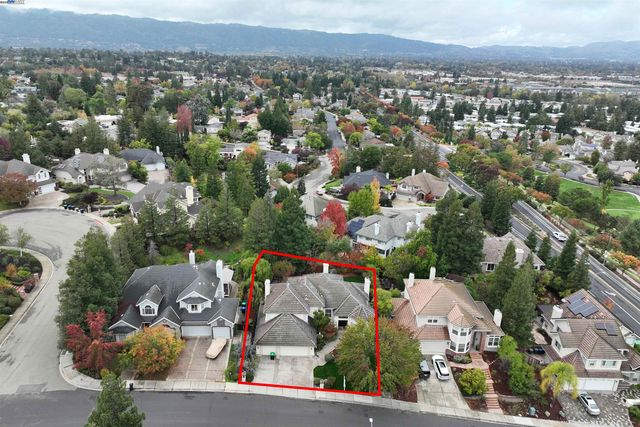 an aerial view of a city with lots of residential buildings