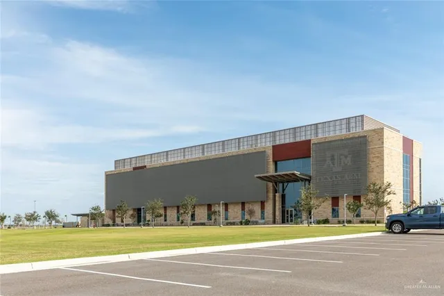 a view of a building with a street