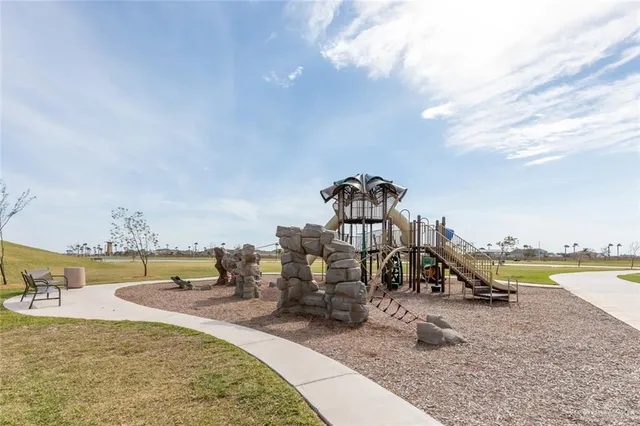 a view of a swimming pool near a yard