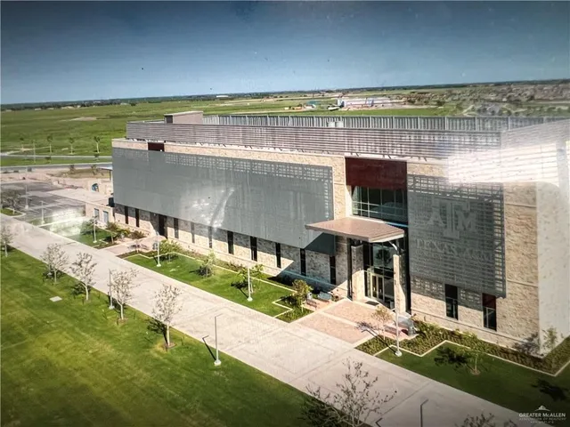 a view of a swimming pool with an outdoor seating