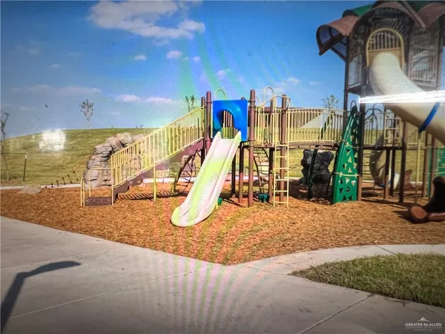 a view of a hall with a flat screen tv