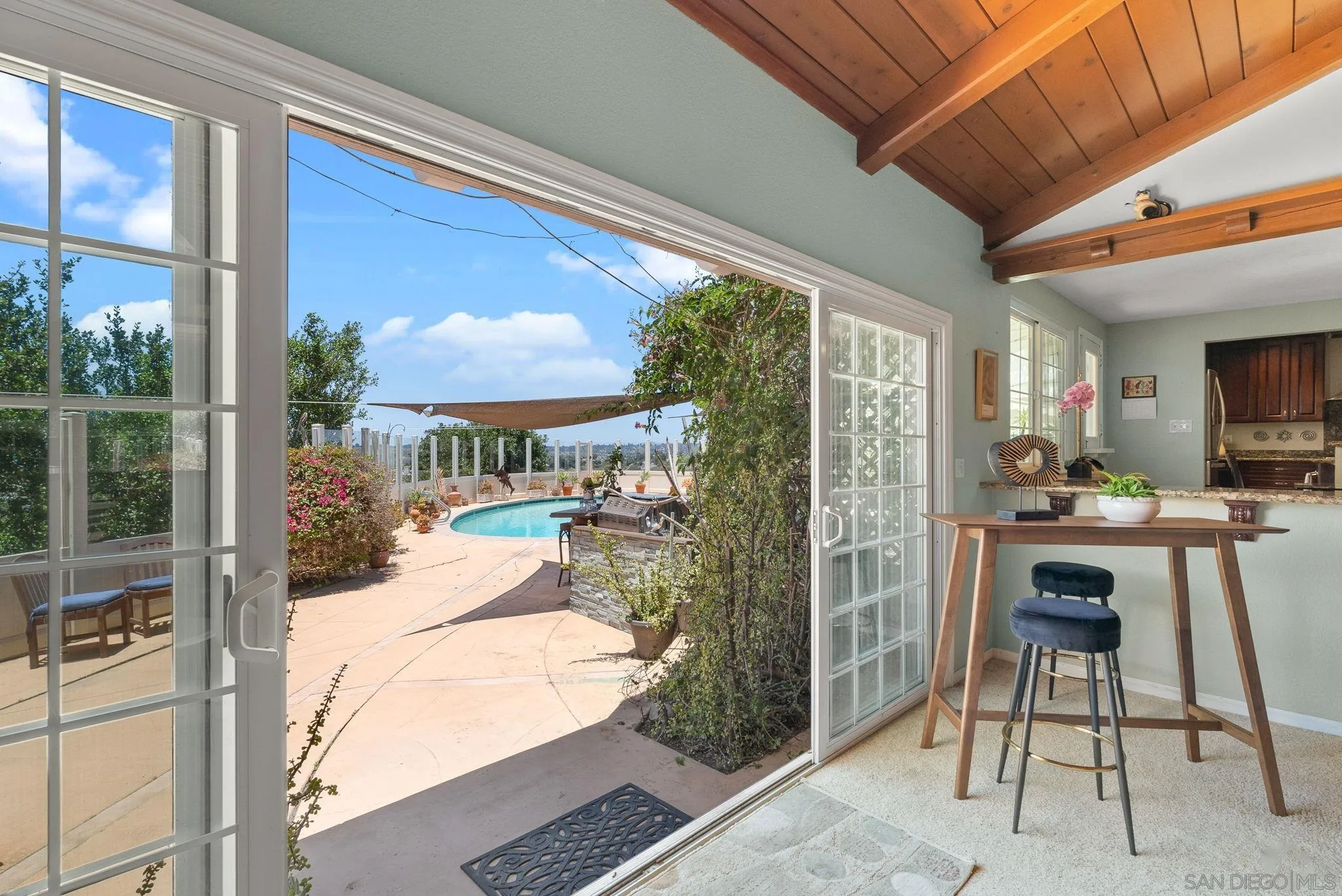 5492 Redding Road San Diego, CA 92115 - Photo 21 of 74 a view of a dining room with furniture window and outside view