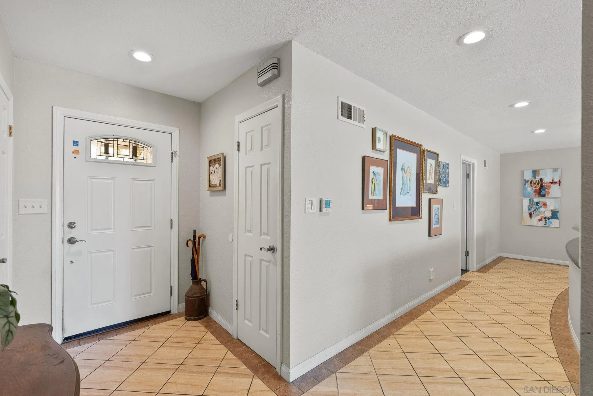 5492 Redding Road San Diego, CA 92115 - Photo 6 of 74 a view of a big room with closet and windows