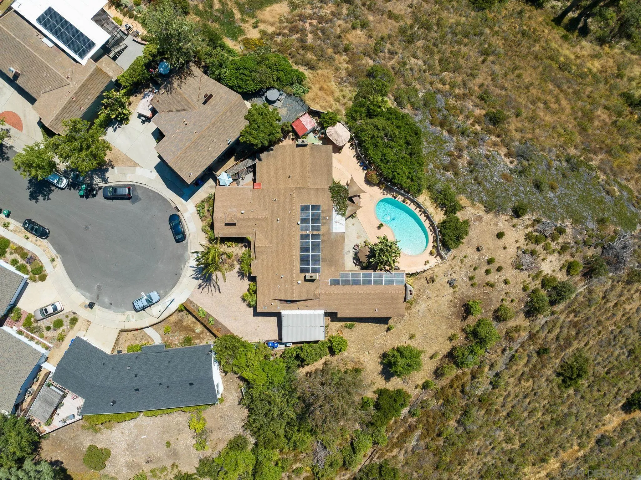 5492 Redding Road San Diego, CA 92115 - Photo 74 of 74 an aerial view of a house with a yard and trees