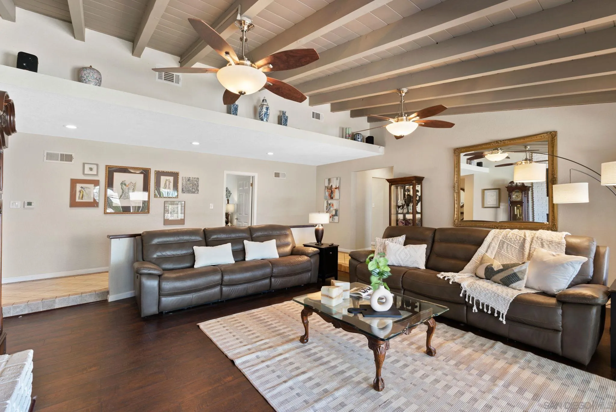 5492 Redding Road San Diego, CA 92115 - Photo 9 of 74 a living room with furniture and a chandelier