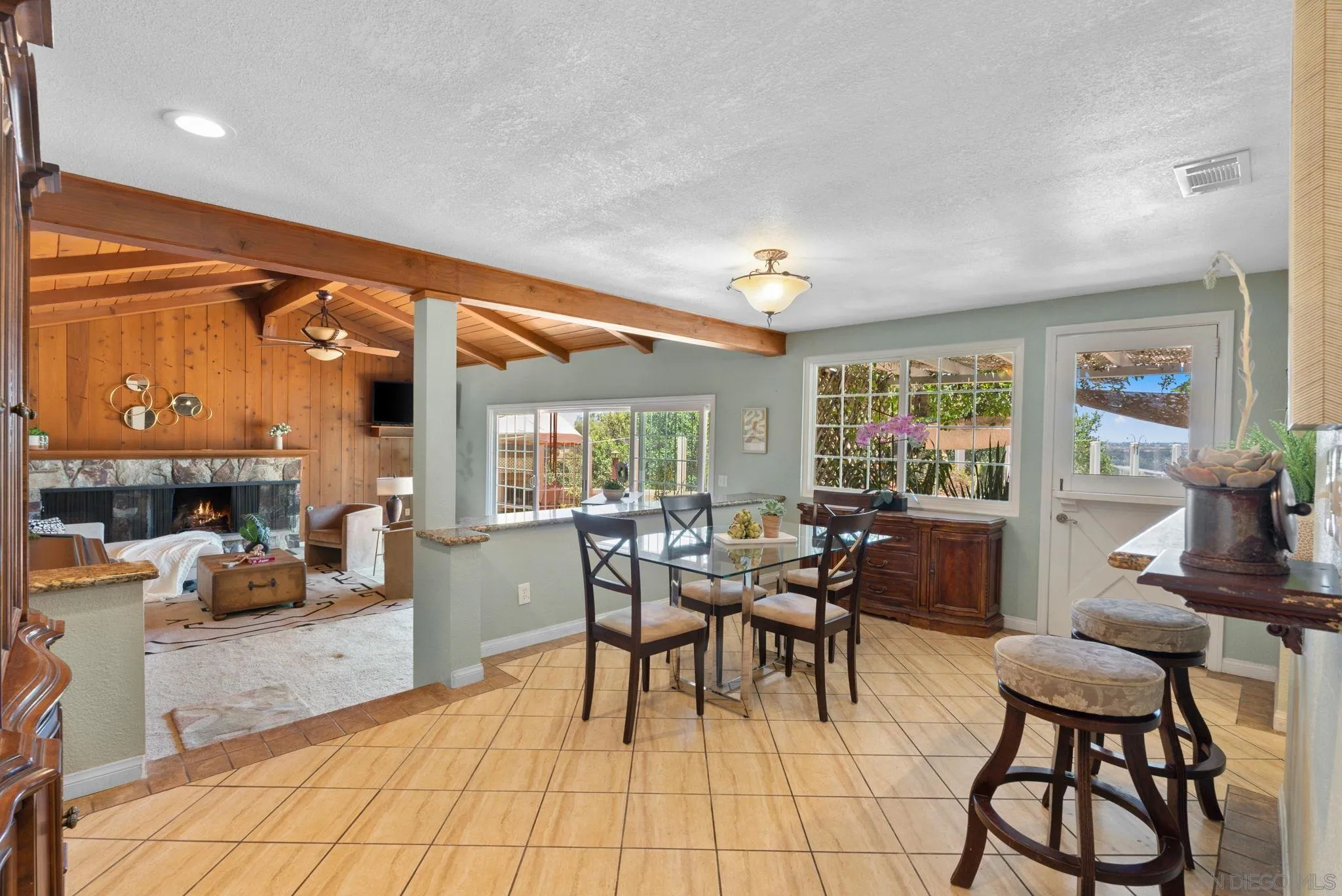 5492 Redding Road San Diego, CA 92115 - Photo 10 of 74 a view of a dining room with furniture window and outside view
