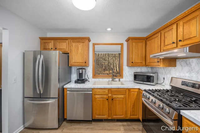 $275,000 | 2885 Hidden View Drive Southeast, Caledonia, MI 49316