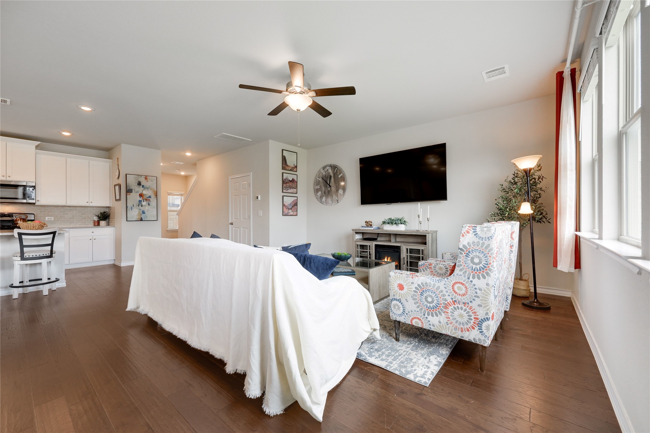 7404 Albany Drive Austin, TX 78754 - Photo 10 of 40 Tall ceilings add depth of space while the fan keeps the air flowing.