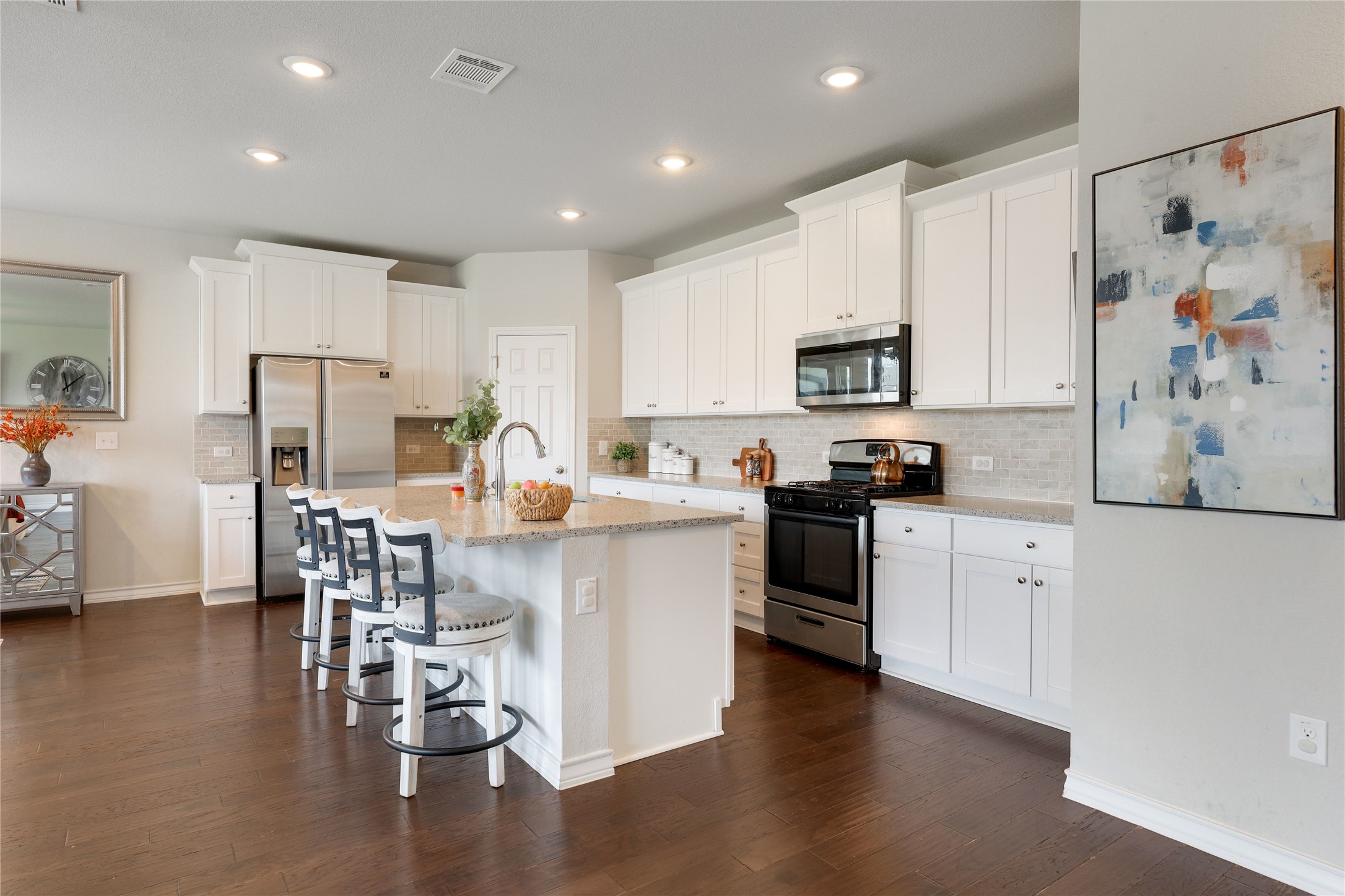 7404 Albany Drive Austin, TX 78754 - Photo 11 of 40 The kitchen boasts an abundance of counter space and cabinetry storage with timeless Shaker-style cabinetry.